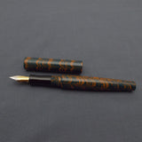 Kiwi Ipsit FT Handmade Ebonite Fountain Pen with Flex Nib - Orange/Teal Mottled